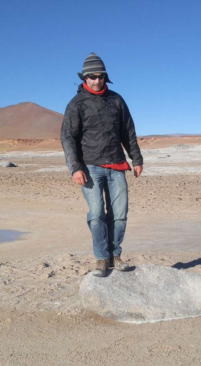 Todd Blattner standing steadily in a stark high-desert landscape